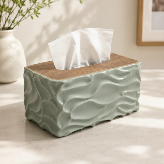 Tissue box cover with wavy design and wooden top on a light surface