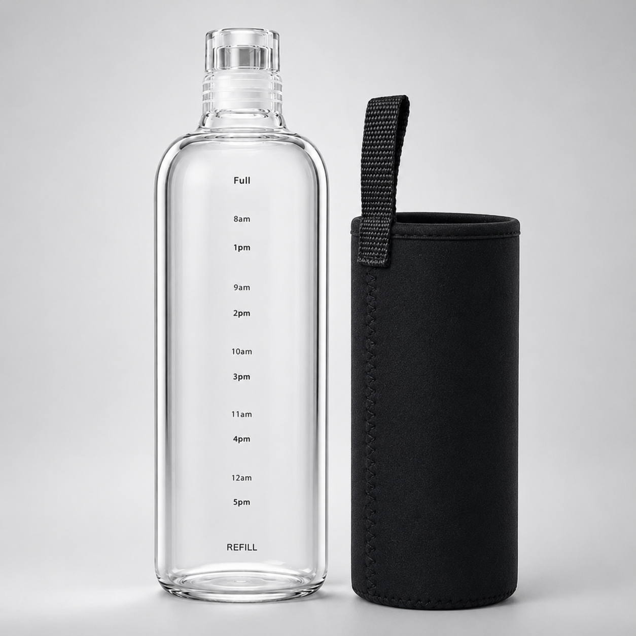 Clear water bottle with measurement markings and a black sleeve on a light gray background