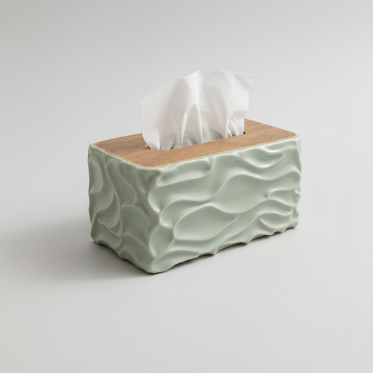 Tissue box cover with wavy design and wooden top on a light surface
